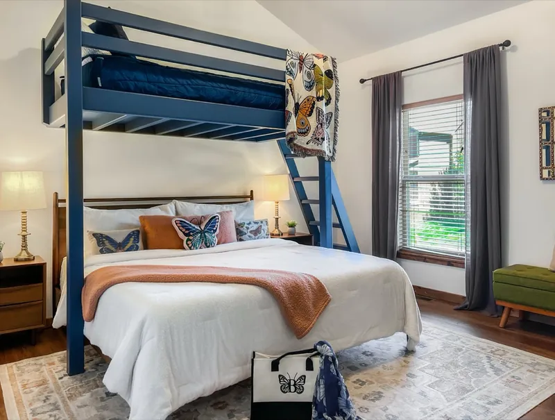 Loft-bunk queen room after: a loft bunk over a queen bed