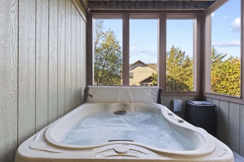 Hot tub porch before: bare grey walls