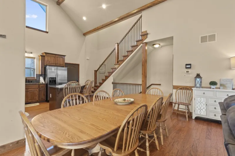 Dining before: oval oak table and spindle chairs