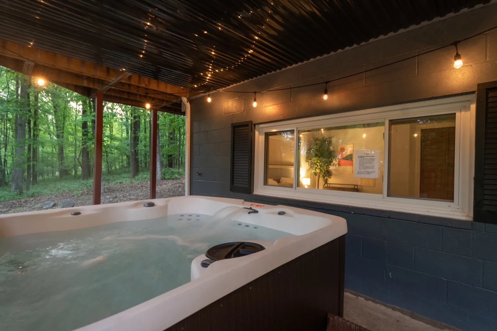 Hot tub before, against a bare wall