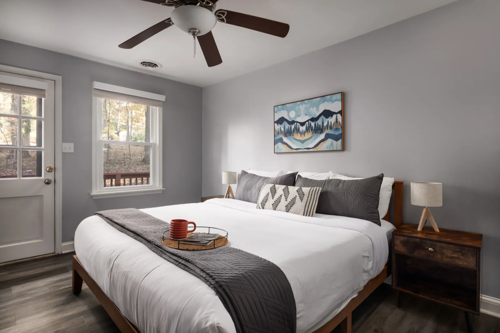 Bedroom after: grey and white bedding