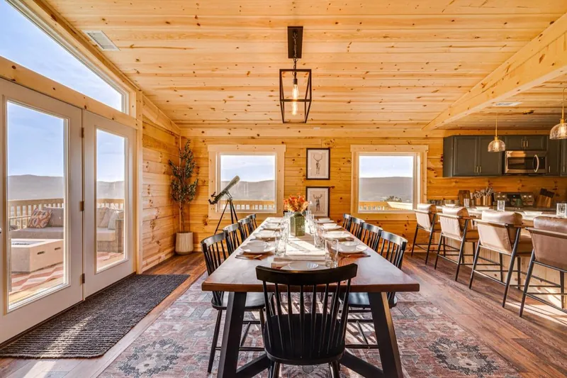 Finished dining room: one long table under the windows